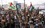 Houthi supporters chant slogans during a weekly anti-US and anti-Israel rally in Sanaa, Yemen, on April 18, 2025. Some of the placards bear the group's slogan "God is the greatest, Death to America, Death to Israel, a Curse on the Jews, Victory to Islam." (AP Photo/Osamah Abdulrahman)