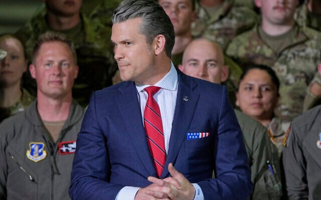 Defense Secretary Pete Hegseth arrives before President Donald Trump speaks to members of the Michigan National Guard at Selfridge Air National Guard Base, Tuesday, April 29, 2025, in Harrison Township, Mich. (AP Photo/Alex Brandon)