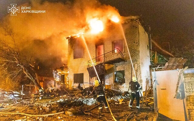 File: In this photo provided by the Ukrainian Emergency Service, emergency services personnel work to extinguish a fire following a Russian attack in Kharkiv, Ukraine, Wednesday, April 30, 2025. (Ukrainian Emergency Service via AP)