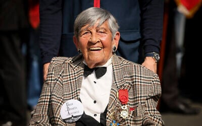 Holocaust survivor Ginette Kolinka, 100, attends a commemorative ceremony to mark the 80th anniversary of the return of death camp deportees, in Paris, France, April 27, 2025. (AP Photo/Thomas Padilla)