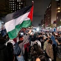 Pro-Palestinian, anti-Israel protesters gather near an area where people were being taken into custody near Columbia University campus in New York, April 30, 2024. (AP/Craig Ruttle)