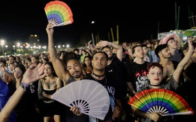 Fans cheer as they watch Lady Gaga's free concert on Copacabana beach, in Rio de Janeiro, Saturday, May 3, 2025. (AP Photo/Bruna Prado)