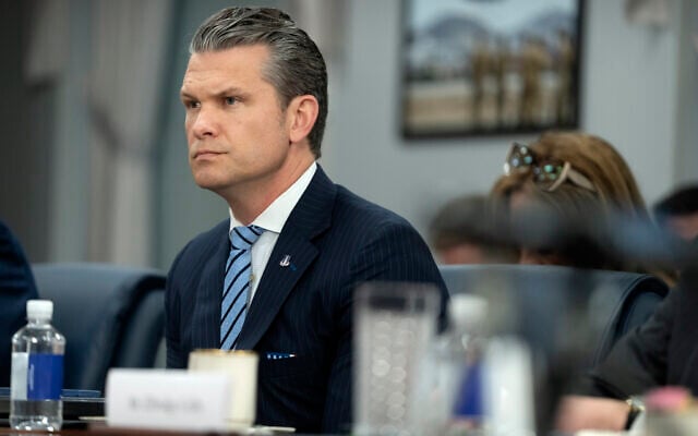 Secretary of Defense Pete Hegseth listens during a meeting at the Pentagon, May 5, 2025, in Washington. (AP Photo/Mark Schiefelbein)