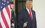 US President Donald Trump waiting to greet Canadian Prime Minister Mark Carney at the West Wing of the White House, in Washington, May 6, 2025. (Mark Schiefelbein/AP)