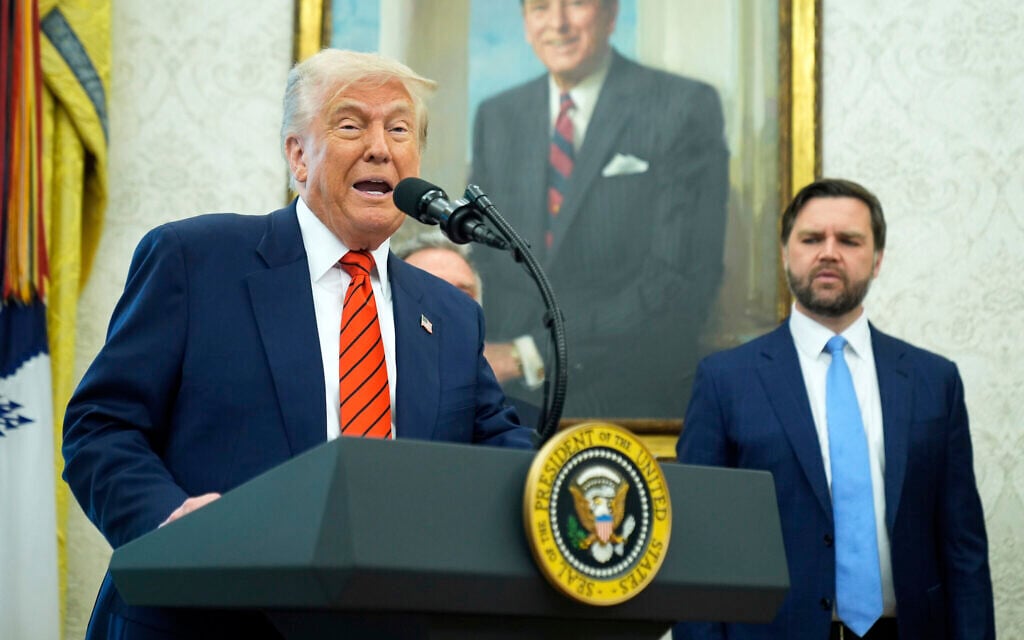 President Donald Trump speaks before Steve Witkoff is sworn as special envoy during a ceremony in the Oval Office of the White House, Tuesday, May 6, 2025, in Washington, as Vice President JD Vance watches. (AP Photo/Mark Schiefelbein)