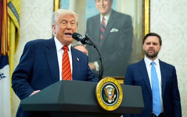 President Donald Trump speaks before Steve Witkoff is sworn as special envoy during a ceremony in the Oval Office of the White House, Tuesday, May 6, 2025, in Washington, as Vice President JD Vance watches. (AP Photo/Mark Schiefelbein)