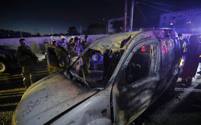 Lebanese army soldiers and rescue workers gather next to a damaged car after an Israeli strike, in the southern port city of Sidon, Lebanon, early Wednesday, May 7, 2025. (AP/Mohammed Zaatari) Lebanese army soldiers and rescue workers gather next to a damaged car after an Israeli strike, in the southern port city of Sidon, Lebanon, early Wednesday, May 7, 2025. (AP/Mohammed Zaatari)