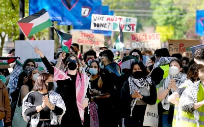 FILE- Pro-Palestinian, anti-Israel protesters demonstrate on the campus of DePaul University, April 30, 2024, in Chicago. (AP Photo/Charles Rex Arbogast, file)