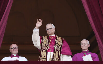 Cardinal Robert Prevost appears on the central loggia of St. Peter's Basilica after being chosen the 267th pontiff of the Roman Catholic Church, choosing the name of Pope Leo XIV, at the Vatican, May 8, 2025. (AP/Alessandra Tarantino)