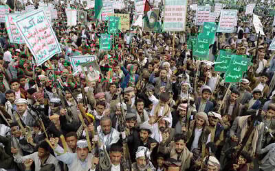 Supporters of the Iran-backed Houthi group in Yemen attend a weekly anti-US and anti-Israel rally in the rebel-held capital Sanaa, on May 9, 2025. (AP Photo/Osamah Abdulrahman)