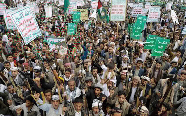 Supporters of the Iran-backed Houthi group in Yemen attend a weekly anti-US and anti-Israel rally in the rebel-held capital Sanaa, on May 9, 2025. (AP Photo/Osamah Abdulrahman)