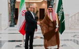 Iranian Foreign Minister Abbas Araghchi, left, shakes hands with his Saudi counterpart Prince Faisal bin Farhan during their meeting in Jeddah, Saudi Arabia, May 10, 2025. (Iranian Foreign Ministry via AP)