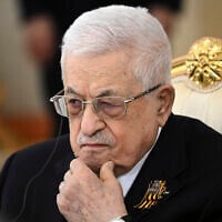 Palestinian Authority President Mahmoud Abbas listens to Russian President Vladimir Putin during their talks in the Grand Palace at the Kremlin in Moscow, Russia, Thursday, on Saturday, May 10, 2025, as part of celebrations of the 80th anniversary of the Soviet Union's victory over Nazi Germany during the World War II. (Sergei Bobylev/Photo host agency RIA Novosti via AP)