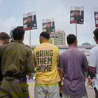 Israelis gather to watch a live broadcast of Israeli-American soldier Edan Alexander to be released from Hamas captivity in Gaza in Tel Aviv, Monday, May 12, 2025. (AP/Oded Balilty)