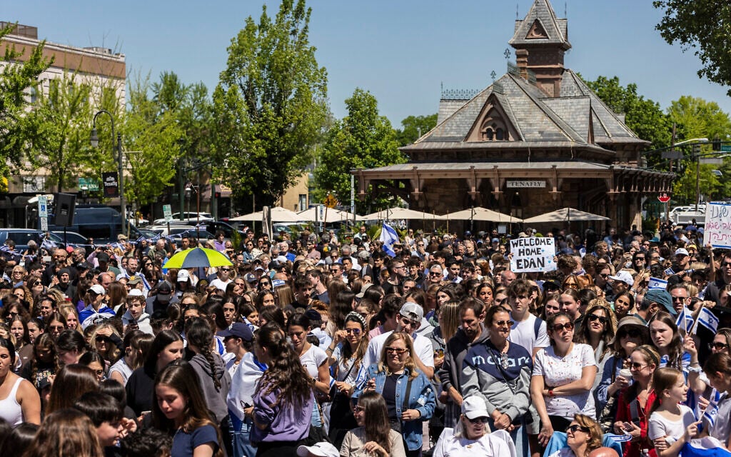 People gather in Huyler Park to celebrate the release of American-Israeli hostage Edan Alexander by Hamas on May 12, 2025, in Tenafly, New Jersey (AP Photo/Stefan Jeremiah)