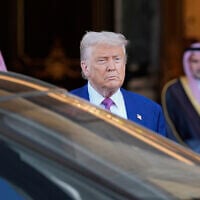 President Donald Trump looks on as he leaves the Royal Palace after a signing ceremony with Saudi Crown Prince Mohammed bin Salman in Riyadh, Saudi Arabia, Tuesday, May 13, 2025. (AP Photo/Alex Brandon)
