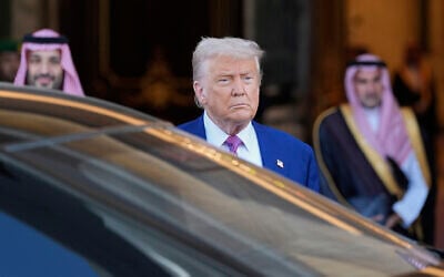 President Donald Trump looks on as he leaves the Royal Palace after a signing ceremony with Saudi Crown Prince Mohammed bin Salman in Riyadh, Saudi Arabia, Tuesday, May 13, 2025. (AP Photo/Alex Brandon)