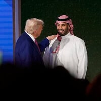 US President Donald Trump shakes hands with Saudi Crown Prince Mohammed bin Salman after his speech at the King Abdulaziz International Conference Center in Riyadh, Saudi Arabia, Tuesday, May 13, 2025. (AP Photo/Alex Brandon)