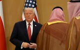 US President Donald Trump arrives for the group photo with Gulf Cooperation Council leaders during the GCC Summit in Riyadh, Saudi Arabia, May 14, 2025. (AP Photo/Alex Brandon)