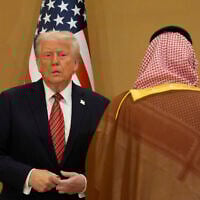 US President Donald Trump arrives for the group photo with Gulf Cooperation Council leaders during the GCC Summit in Riyadh, Saudi Arabia, May 14, 2025. (AP Photo/Alex Brandon)