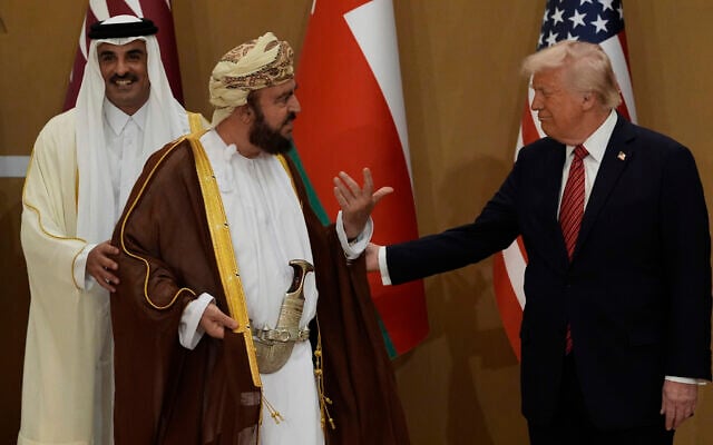 US President Donald Trump speaks with Oman's Deputy Prime Minister for International Affairs Al Sayyid Asaad Tariq Taimur Al Said, center, and Qatar's Emir Sheikh Tamim bin Hamad Al Thani as they arrive to attend a group photo with Gulf Cooperation Council leaders during the GCC Summit in Riyadh, Saudi Arabia, May 14, 2025. (AP Photo/Alex Brandon) US President Donald Trump speaks with Oman's Deputy Prime Minister for International Affairs Al Sayyid Asaad Tariq Taimur Al Said, center, and Qatar's Emir Sheikh Tamim bin Hamad Al Thani as they arrive to attend a group photo with Gulf Cooperation Council leaders during the GCC Summit in Riyadh, Saudi Arabia, May 14, 2025. (AP Photo/Alex Brandon)