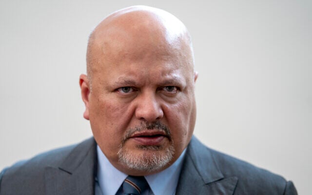 Karim Khan, Prosecutor of the International Criminal Court looks up prior to a press conference in The Hague, Netherlands, July 3, 2023. (Peter Dejong/AP)