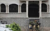 Israeli soldiers search a Palestinian village next to the West Bank settlement of Bruchin, the morning after a Palestinian gunman killed Tzeela Gez, who was on her way to the hospital to give birth, May 15, 2025. (AP /Maya Alleruzzo)