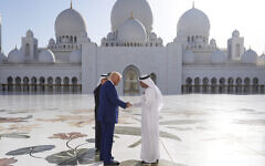 US President Donald Trump (left) shakes hands with Yousif Al Obaidli, director of Sheikh Zayed Grand Mosque, during a tour of the Sheikh Zayed Grand Mosque, Thursday, May 15, 2025, in Abu Dhabi, United Arab Emirates. (AP Photo/Alex Brandon)