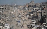 Displaced Palestinians fleeing Beit Lahiya amid ongoing military operations in the Gaza Strip arrive in Jabalia, northern Gaza, May 16, 2025. (AP Photo/Jehad Alshrafi)