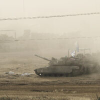 Israeli tanks parked in a staging area in southern Israel, near the border with Gaza, Friday, May 16, 2025. (AP Photo/Maya Alleruzzo)