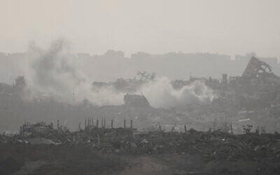 Smoke rises following an Israeli airstrike in the Gaza Strip, seen from southern Israel, May 18, 2025. (AP Photo/Ariel Schalit)