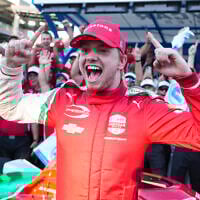 Robert Shwartzman, of Israel, celebrates after winning the pole position during qualifications for the Indianapolis 500 auto race at Indianapolis Motor Speedway in Indianapolis, May 18, 2025. (Michael Conroy/AP)