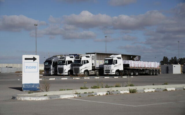 Trucks loaded with humanitarian aid for the Gaza Strip are seen at the Kerem Shalom Crossing in southern Israel, May 20, 2025. (AP Photo/Maya Alleruzzo)
