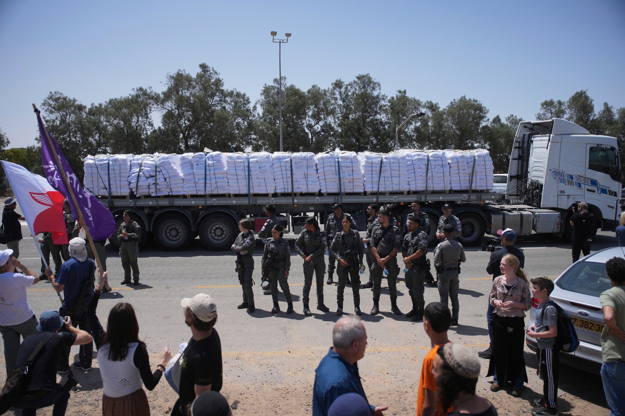 Two right-wing activists arrested after groups try to block aid trucks reaching Gaza