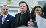 Elon Musk looks on as US President Donald Trump meets South African President Cyril Ramaphosa in the Oval Office of the White House, May 21, 2025, in Washington. (AP Photo/Evan Vucci)
