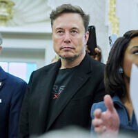 Elon Musk looks on as US President Donald Trump meets South African President Cyril Ramaphosa in the Oval Office of the White House, May 21, 2025, in Washington. (AP Photo/Evan Vucci)
