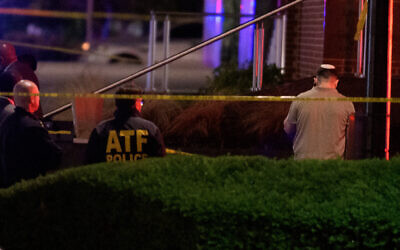 Law enforcement work the scene after two staff members of the Israeli Embassy in Washington were shot and killed outside the Capital Jewish Museum, May 22, 2025, in Washington. (AP Photo/Rod Lamkey, Jr.)