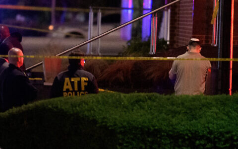 Law enforcement work the scene after two staff members of the Israeli Embassy in Washington were shot and killed outside the Capital Jewish Museum, May 22, 2025, in Washington. (AP Photo/Rod Lamkey, Jr.)