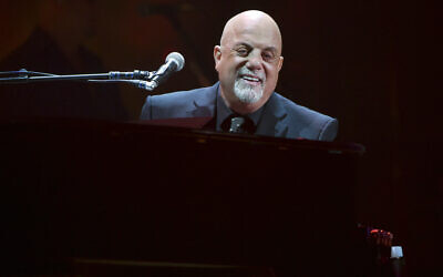 File: Musician Billy Joel performs during his 100th lifetime performance at Madison Square Garden on Wednesday, July 18, 2018, in New York. (Evan Agostini/Invision/AP, File)