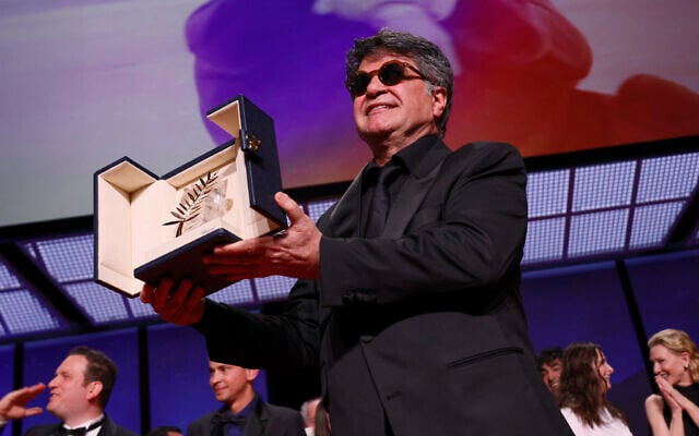 Director Jafar Panahi, accepts the Palme d'Or for the film 'It Was Just an Accident', during the awards ceremony of the 78th international film festival, Cannes, southern France, May 24, 2025. (Joel C Ryan/Invision/AP) Director Jafar Panahi, accepts the Palme d'Or for the film 'It Was Just an Accident', during the awards ceremony of the 78th international film festival, Cannes, southern France, May 24, 2025. (Joel C Ryan/Invision/AP)
