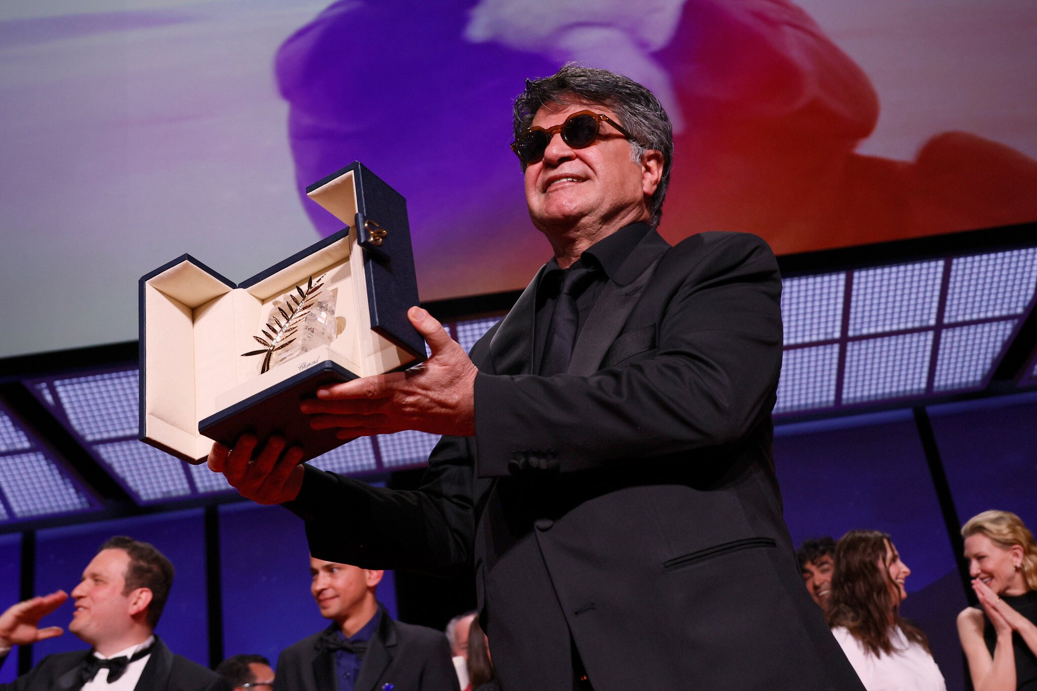 Iranian Director Panahi Wins Cannes Palme d'Or After Travel Ban Lifted