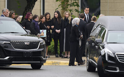 Family and friends arrive at Congregation Beth Torah for a funeral for Sarah Milgrim, a staffer at the Israeli Embassy who was killed last week outside a Washington, DC, Jewish museum, May 27, 2025, in Overland Park, Kansas. (AP Photo/Charlie Riedel)
