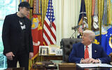 US President Donald Trump (seated) speaks during a news conference with Elon Musk in the Oval Office of the White House, May 30, 2025, in Washington. (AP Photo/Evan Vucci)