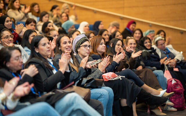 Women from a broad spectrum of Israeli society gather for Kumi's first conference at Sapir College, near Sderot, in southern Israel, on February 26, 2025. (Noa Sharvit)