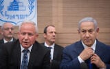 Prime Minister Benjamin Netanyahu (R) and chairman of the Knesset's Foreign Affairs and Defense Committee Avi Dichter attend a committee meeting in Jerusalem, November 19, 2018. (Miriam Alster/Flash90)