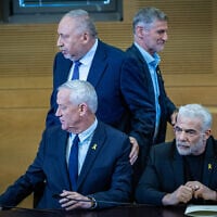 Head of The Democrats party Yair Golan, head of National Unity party Benny Gantz, head of Yesh Atid party Yair Lapid and head of Yisrael Beytenu party Avigdor Liberman hold a joint press conference at the Knesset in Jerusalem, November 6, 2024. (Yonatan Sindel/Flash90)