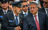 National Security Minister Itamar Ben Gvir (right) with Police Chief Commissioner Daniel Levy mark Memorial Day at Mount Herzl military cemetery on April 30, 2025. (Arie Leib Abrams/Flash90)