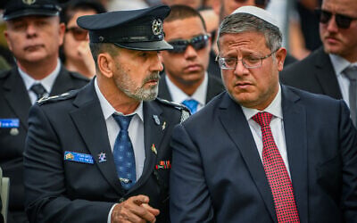 National Security Minister Itamar Ben Gvir (right) with Police Chief Commissioner Daniel Levy mark Memorial Day at Mount Herzl military cemetery on April 30, 2025. (Arie Leib Abrams/Flash90)