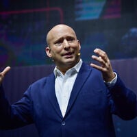Former prime minister Naftali Bennett speaks during a tech conference in Ness Ziona, May 5, 2025. (Avshalom Sassoni/Flash90)