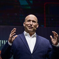 Former prime minister Naftali Bennett speaks during the Israel Information Technology Conference in Ness Ziona, May 5, 2025. (Avshalom Sassoni/Flash90)